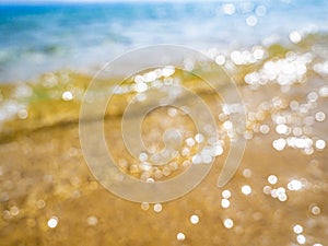 Abstract sea background. Abstract sandy summer beach background with bokeh lights on light blue sky. Beautiful texture. Space