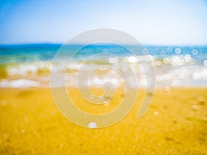 Abstract sea background. Abstract sandy summer beach background with bokeh lights on light blue sky. Beautiful texture. Space