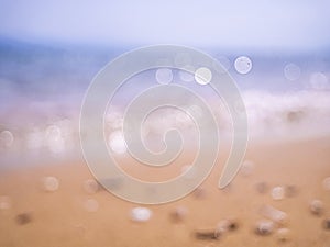 Abstract sea background. Abstract sandy summer beach background with bokeh lights on light blue sky. Beautiful texture. Space