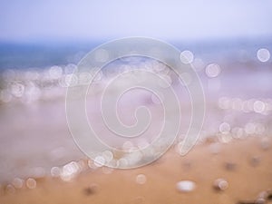 Abstract sea background. Abstract sandy summer beach background with bokeh lights on light blue sky. Beautiful texture. Space