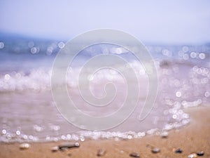 Abstract sea background. Abstract sandy summer beach background with bokeh lights on light blue sky. Beautiful texture. Space