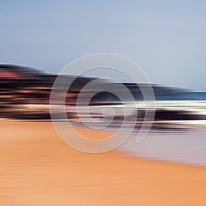 Abstract sea background, long exposure view of dreamy ocean coast in summer