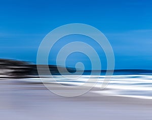 Abstract sea background, long exposure view of dreamy ocean coast in summer