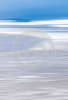 Abstract sea background, long exposure view of dreamy ocean coast in summer