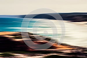 Abstract sea background, long exposure view of dreamy ocean coast in summer