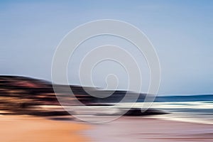 Abstract sea background, long exposure view of dreamy ocean coast in summer