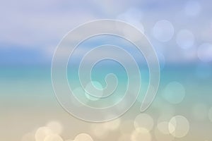 Abstract sea background. Abstract tropical sandy summer beach background with bokeh lights on light blue sky and sun. Beautiful
