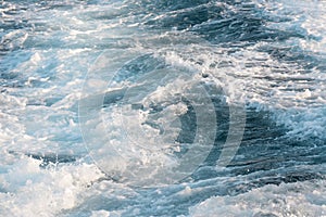 Abstract sea, ocean surface with white and blue tones