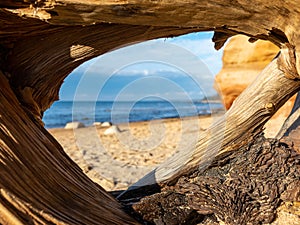 Sea view through sandstone cave