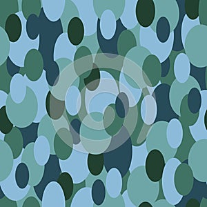 Abstract seamless background texture with different ovals. Blue, navy, green. Like optical camouflage pattern. For fabric,