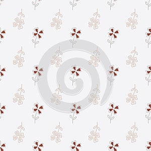 Abstract seamless floral pattern with four-leaf clower ornament. Pastel background. Bloom print