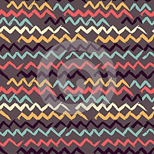 Abstract seamless hand drawn pattern. Modern grunge texture. Colorful pen-brush painted background. Texture with zigzag