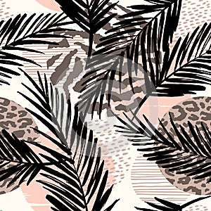 Abstract seamless pattern with animal print, tropical plants and geometric shapes.