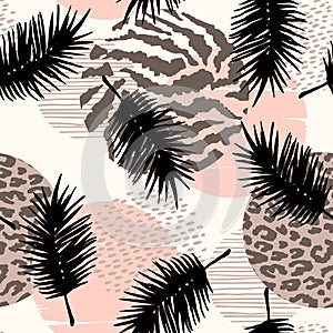 Abstract seamless pattern with animal print, tropical plants and geometric shapes.