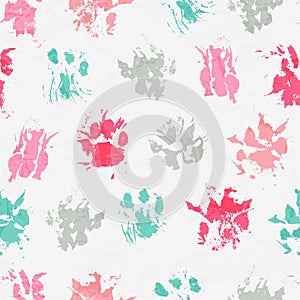 Abstract seamless pattern - black ink prints with messy cat paws.