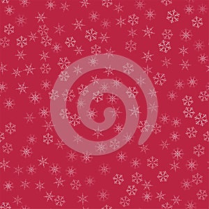 Abstract seamless pattern Christmas background of snowflakes on a red. For design of cards, invitations, greeting for the new year