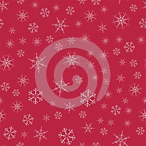 Abstract seamless pattern Christmas background of snowflakes on a red. For design of cards, invitations, greeting for the new year