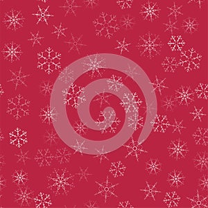 Abstract seamless pattern Christmas background of snowflakes on a red. For design of cards, invitations, greeting for the new year