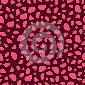 Abstract seamless pattern on a dark bard background with irregular ovals