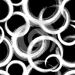 Abstract seamless pattern. Geometric texture. Repeated geometry brush stroke. White circle on black background. Repeating grunge r