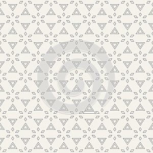 Abstract seamless pattern of symmetrically arranged triangles and diamonds.