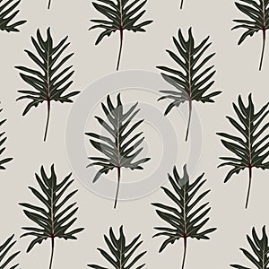 Abstract seamless tropical pattern with dark green colorful leaves on vintage background. Seamless exotic pattern with tropical pl