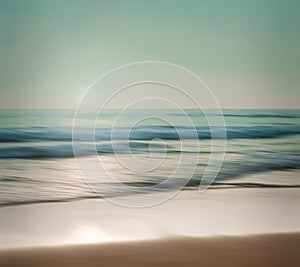 An abstract seascape with blurred panning motion on paper background photo