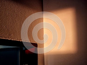Abstract shadow and striped natural sunlight background on wall from window, architecture dark gray and sunshine diagonal