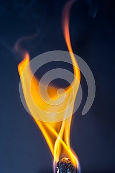 Abstract shaped flame of a match in closeup
