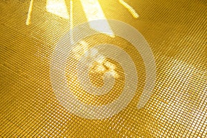 Abstract shiny golden mosaic floor background