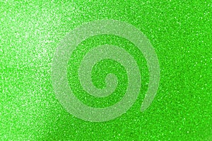 Abstract shiny green glitter texture background