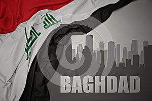 Abstract silhouette of the city with text Baghdad near waving national flag of iraq on a gray background.3D illustration