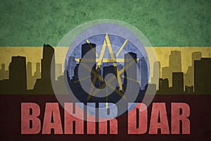 Abstract silhouette of the city with text Bahir Dar at the vintage ethiopian flag