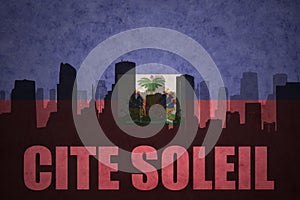 Abstract silhouette of the city with text Cite Soleil at the vintage haitian flag