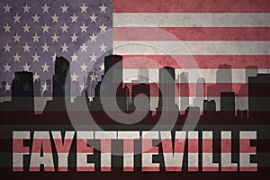 Abstract silhouette of the city with text Fayetteville at the vintage american flag