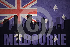 Abstract silhouette of the city with text Melbourne at the vintage australian flag