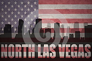 Abstract silhouette of the city with text North Las Vegas at the vintage american flag photo
