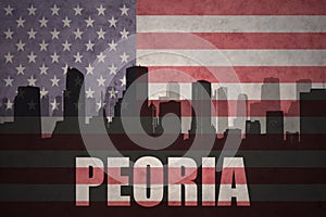 Abstract silhouette of the city with text Peoria at the vintage american flag