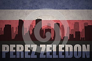 Abstract silhouette of the city with text Perez Zeledon at the vintage costa rican flag photo