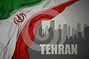 Abstract silhouette of the city with text Tehran near waving national flag of iran on a gray background.3D illustration