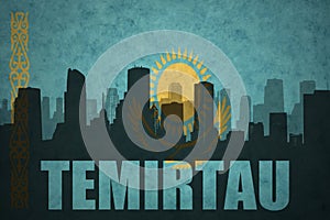 Abstract silhouette of the city with text Temirtau at the vintage kazakhstan flag