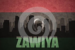 Abstract silhouette of the city with text Zawiya at the vintage libyan flag