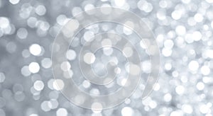 Abstract silver bokeh glitter background texture