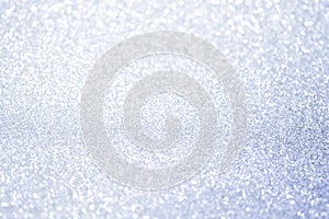 Abstract silver glitter bokeh lights with soft light background