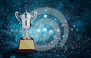 abstract silver trophies with blue bokeh lighting. copy space re