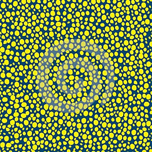 abstract simple seamless pattern many small dots spots on a contrasting background. Leopard background yellow green