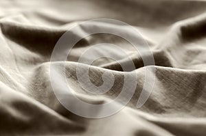 Abstract. Smooth elegant brown fabric can use as background. In Sepia toned. Retro style.