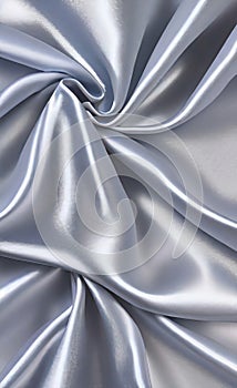 Abstract smooth elegant white fabric silk texture soft background, flowing satin waves. Gray, silver fabric silk texture close up.