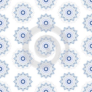 Abstract snowflakes seamless pattern. geometric snowflake on blue background.