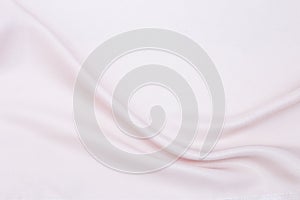 Abstract soft pink fabric texture background, silky pink fabric background